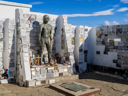 Sculture of a native indio inhabitant, historic cemetery, national monument, Punta Arenas, Chile