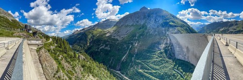 Panoramic view of left footpath and roadway for company vehicles on 200 meter high Kölnbrein dam
