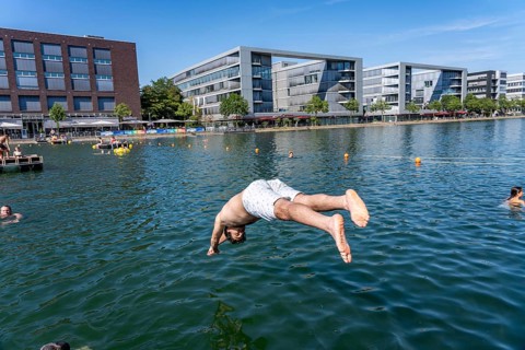 The Duispool, the outdoor harbor pool in Duisburg's inner harbor, in the back harbor basin has