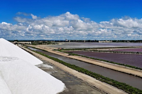 White salt cone, salt marshes, Salins du Midi, behind the historic city wall, Aigues-Mortes,