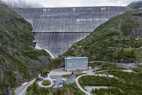 Grande Dixence dam, hotel just below the gravity dam, lake Lac des Dix, aerial view, Switzerland