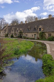 Houses, Arlington Row, Moat, Cotswold Stone, Bibury, The Cotswolds, England, Great Britain