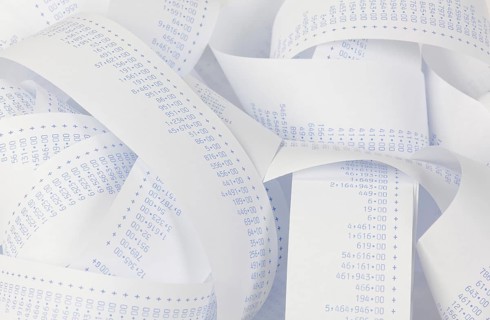 Receipt, receipt roll, math strips with numbers. Symbol for costs, expenses, turnover and profit,