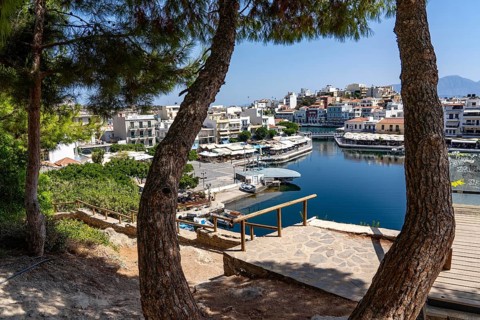 The village of Agios Nikolaos, in the eastern part of Crete, view over Lake Voulismeni, connected