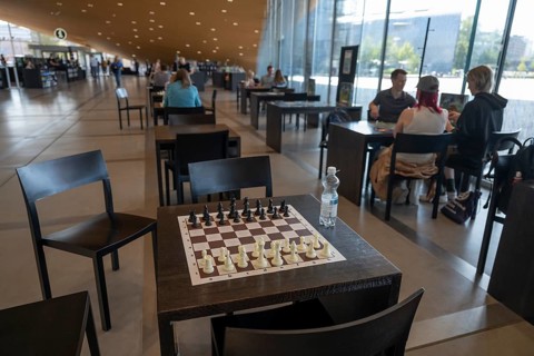 Chess set on a table, ground floor, Oodi Central Library and Cultural Centre, design by ALA