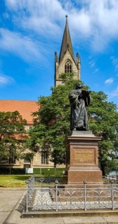 Luther memorial based on a design by Fritz Schaper in front of St Gregory's Merchant Church on the