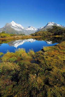 Key Summit with reflection of Mt. Christina, Fiordland National Park, World Heritage South West New