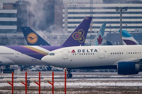 Aircraft on the taxiway at Frankfurt FRA airport, Fraport, in winter, Hesse, Germany