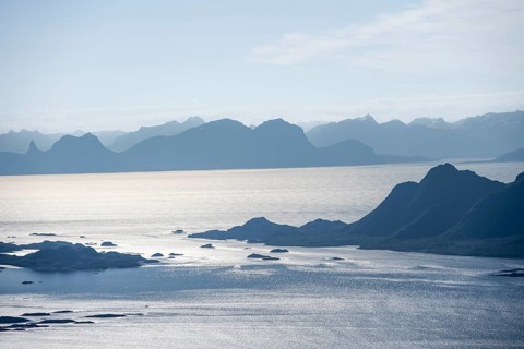 Mountain peak and fjord Austensfjorden, fjord landscape and sea, view from the summit of