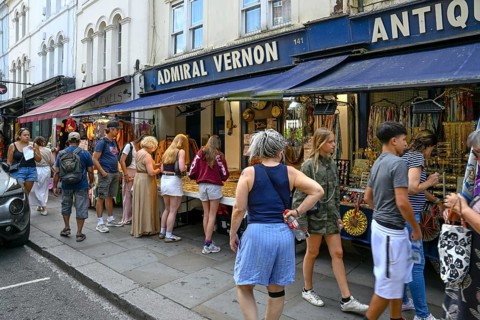 Street scene on Portobello Road, Notting Hill, Royal Borough of Kensington and Chelsea, London,