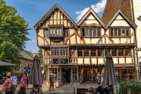 Half-timbered house with hat shop Laird Hatters on Cornmarket Street in Oxford, Oxfordshire,