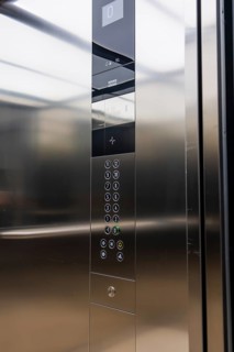 Metal lift with buttons and mirror inside, Boarding House des Klinikverbund Südwest, Böblingen,