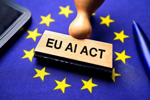 EU AI Act stamp on EU flag, photo montage +++ editorial use only