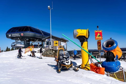 Winter sports area in the Sauerland, Winterberg ski lift carousel, artificial snow slopes,