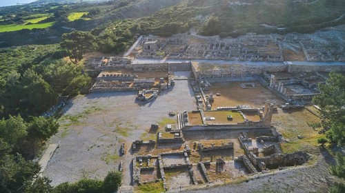 Drone shot, first morning light, Ancient ruins of an archaeological site surrounded by green nature