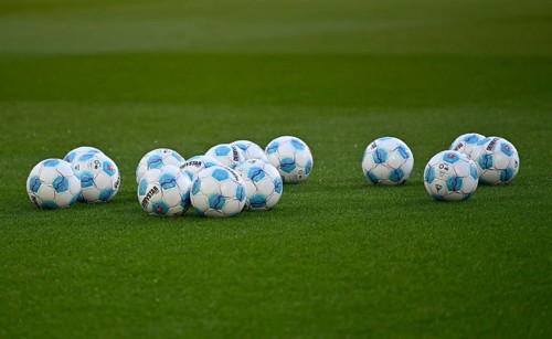 Adidas Derbystar match balls on the pitch, WWK Arena, Augsburg, Bavaria, Germany