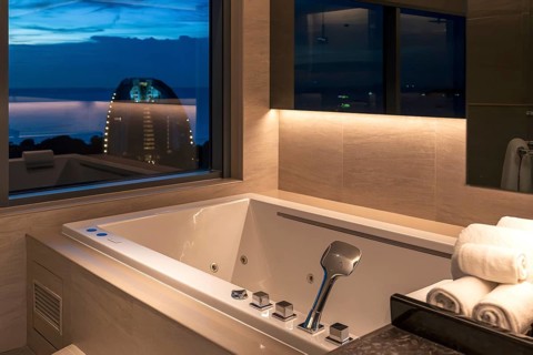 Hotel bathroom hot tub with view, Pattaya, Thailand