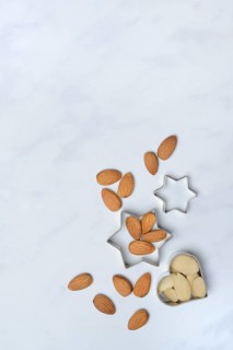 Almonds and biscuit cutters for biscuits, almond kernels
