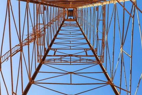Rusted remains of a former oil derrick, Arabian Peninsula, Sultanate of Oman