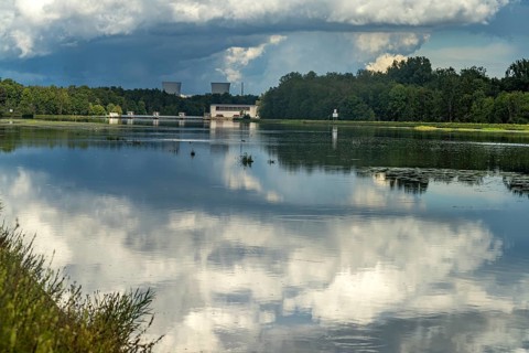 Clouds reflected in the Danube reservoir Faimingen, Lauingen Donau, Bavaria, Germany