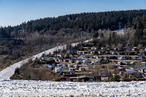 Winter sports area in the Sauerland, Winterberg ski lift carousel, artificial snow pistes,