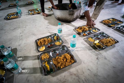 GUWAHATI, INDIA - MARCH 2: Arranged rows of food plates, for Ramadan's first Iftar during Muslim