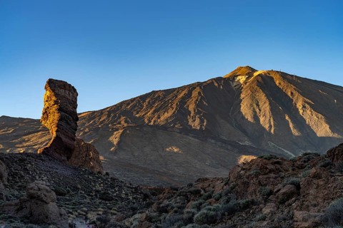 Spain's highest mountain Teide and the Roques de Garcia in Teide National Park, Tenerife, Canary