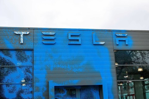 New Generation colour attack with AfD blue on Tesla Center in Berlin Reinickendorf, 31.03.2025