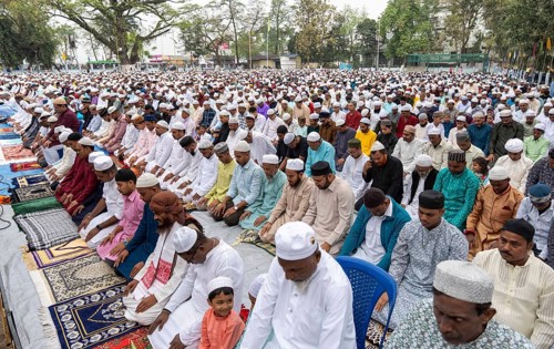 Muslims attend to Eid al-Fitr prayer at Eidgah, on March 21, 2026 in Guwahati, India. Muslims make