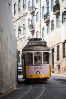 LISBON, PORTUGAL - MAY 19, 2025: Famous tram number 28 at the street of Lisbon