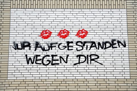 Graffito on a house wall near the Jungfernstieg, Hamburg, Germany