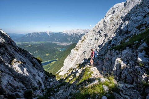 Climber on the ascent to the Westliche Wettersteinspitze, Wetterstein Mountains, Bavaria, Germany