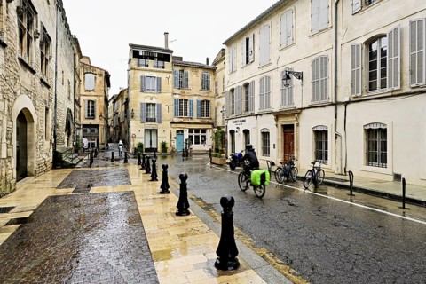 Historic alleyway with cobblestones in the city, Arles, Southern France, France