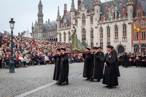 BRUGES, BELGIUM, MAY 17: Annual Procession of the Holy Blood on Ascension Day. Locals carry statue