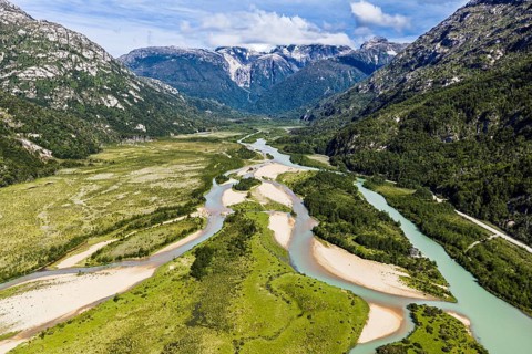 Gravel road along river Rio Norte, Valle Exploradores, aerial view, near Puerto Tranquilo,