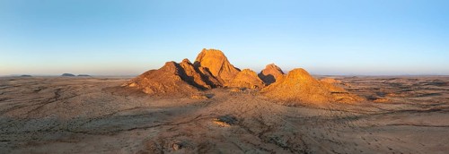 Aerial view, sunset, mountains in the desert, Spitzkoppe summit, Namib desert, Namibia