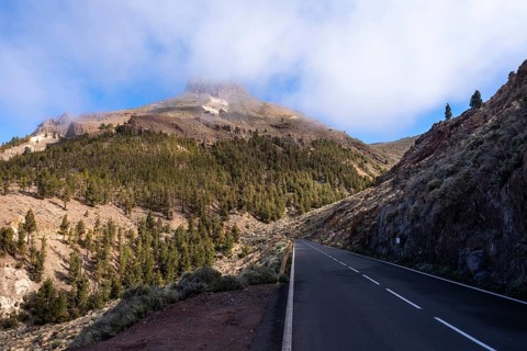 View of El Retamar mountain from the Mirador El Retamar. Sun, blue sky. El Teide National Park,