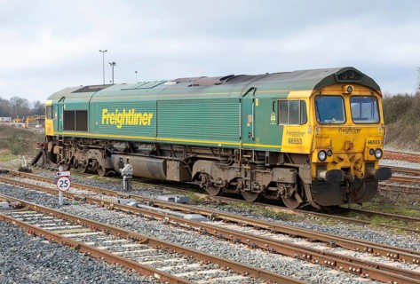 Freightliner 66553 Class 66/5 goods train locomotive in sidings at Westtbury station, Westbury,
