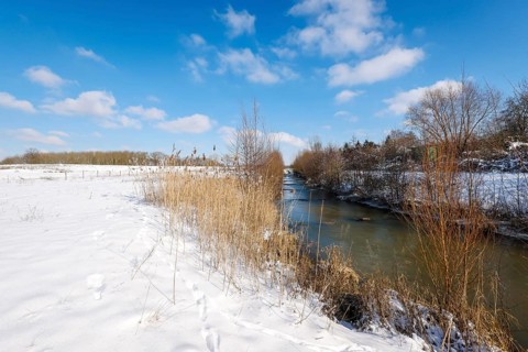 Hamm, North Rhine-Westphalia, Germany - Sunny winter landscape in the Ruhr area, ice and snow on