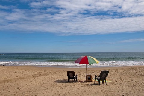 Chairs and parasol on the beach, Sri Lanka