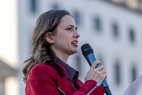 Berlin, Germany - 22.3.2026: Theresia Crone speaks to demonstrators protesting in front of the