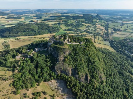 Aerial view of the Hohentwiel volcanic cone with Germany's largest fortress ruin, in the morning