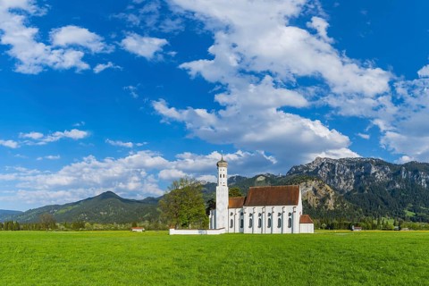 Baroque church of St. Coloman, behind it the Tegelberg mountain range, 1881m, Schwangau, Ostallgäu,