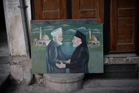 Damascus, Syria. December 10th 2025. A painting depicting a priest and an imam symbolizing