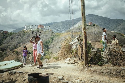 Victims after a major fire in the Petare slum, Caracas, Venezuela