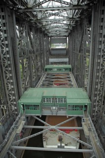 Cargo ship in the lock at the steel structure shipwreck, Niederfinow, Brandenburg, Germany