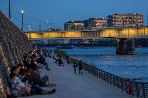 Severinsbrücke across the Rhine, crane houses, cargo ship, Rhine promenade on the Kennedy-Ufer, in