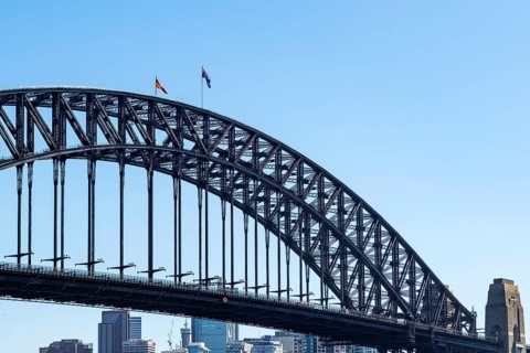 The Australian and Aboriginal flags fly from the arch of the Sydney Harbour Bridge in Sydney,
