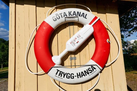 Lifebuoy with Göta Canal inscription, lock near Motala, Östergötland, Sweden