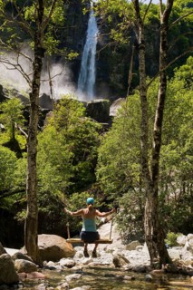 Woman on swing and waterfall, Foroglio, Bavona Valley, Valle Bavona, Maggia Valley, Valle Maggia,